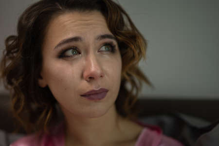 Drunk Woman In Depression Is In The Bedroom And Suffers From Anxiety Drinks Alcohol Wine Alone At Homeの写真素材