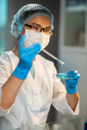Female Medical Worker Conducting Laboratory Analyzes Examining Viruses And Other Human Diseases