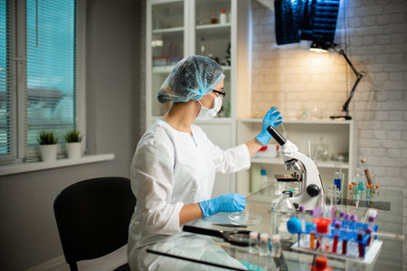 Female Medical Worker Conducting Laboratory Research With Microscope, Test Tubes, Medicines,...