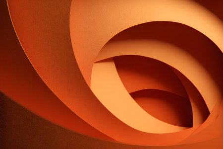 Curved patterns of warm orange hues create a stunning visual effect in a modern architectural spaceの素材