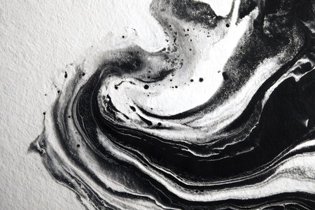 This artwork displays fluid black and white shapes blending together gracefully, with hints of sparkle adding depth. The composition creates a sense of movement and intrigue.の素材