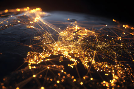 Illuminated map of Europe showcasing city lights and connection networks at nightの素材