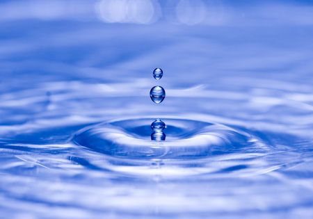 Drops of Water capture mid-dripの写真素材