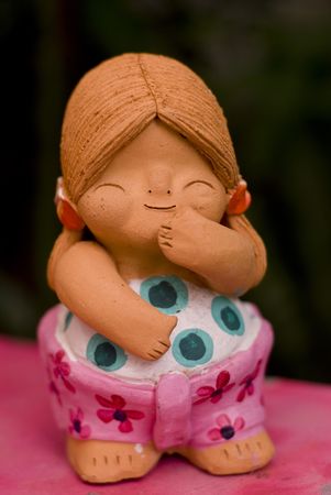 Doll for decorate in thai children form made by clayの写真素材