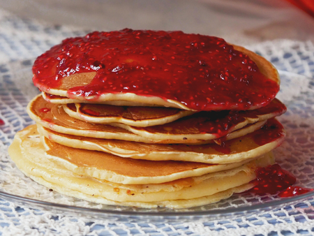 Pancakes with jam lay on the plate.の写真素材