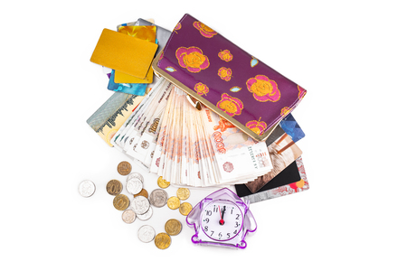 Watches, cash, coins, credit cards and purse on a white background.の写真素材