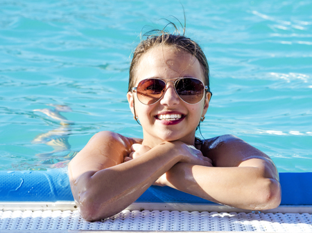 Attractive woman at the resort in summerの写真素材