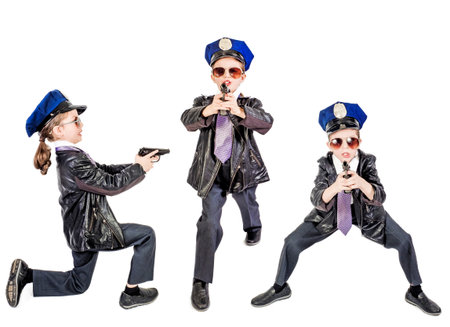 Little long-haired boy as a policeman, isolated on white