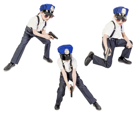 Little long-haired boy as a policeman, isolated on whiteの写真素材