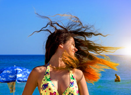 Outdoor fashion photo of beautiful happy woman at sea. Beach travel. Summer vibes. stylish girl in a...