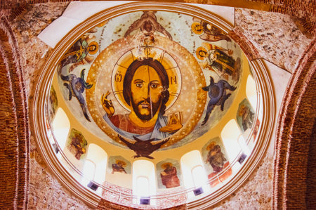 PITSUNDA, ABKHAZIA - January 05, 2013: Interior of Church with the fresco of Jesus..
