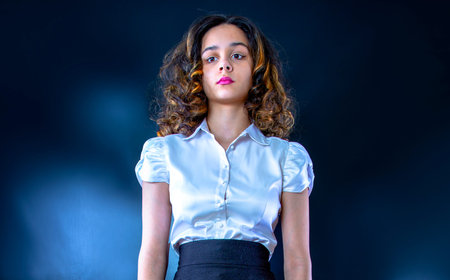 Woman Serious Studio Portait Concept. Isolated on a dark background