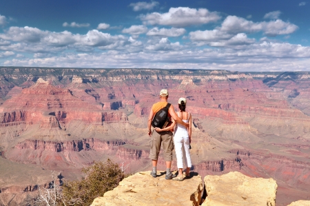 People look out on the Grand Canyonの写真素材