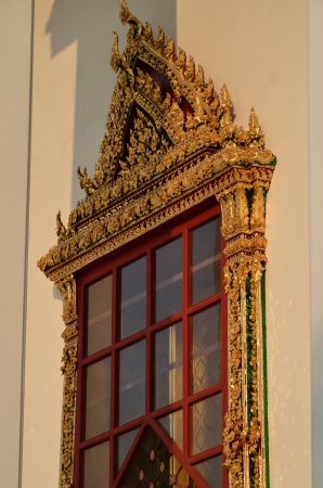 golden ancient window in bangkok Thailandの写真素材