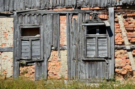 Old broken window on brick wallの写真素材