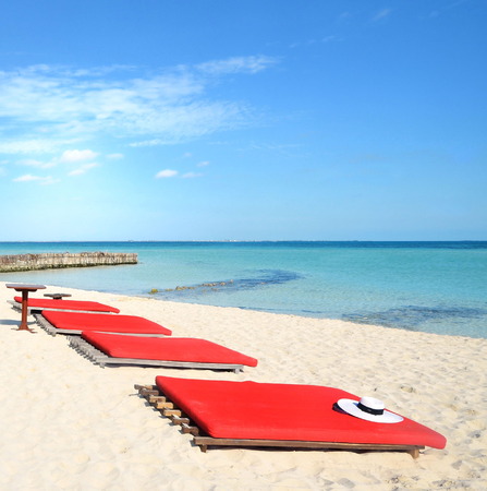 Ref beach mattress on the beach with hatの写真素材