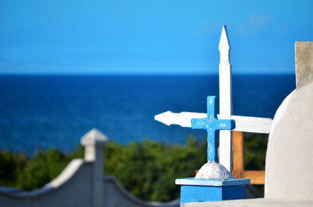 orginal cementary on tropical island with seaの写真素材