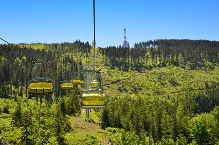 SZCZYRK, POLAND - JUBNE 6 -Yellow cable car on skrzyczne mountain in polandのeditorial素材