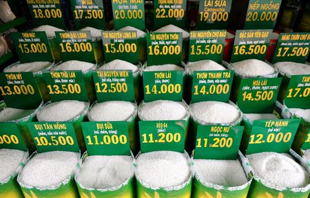 Close up of bags of rice in a local market in Vietnam with priceの写真素材