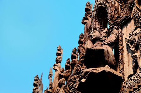 Carvings on top of Shwenandaw Kyaung Temple in Mandalayの写真素材