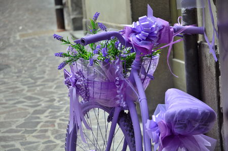 old violet bicycle on streetの写真素材