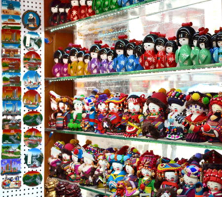 SHANGHAI, CHINA - May 7, 2017 - Handmade dolls are sold as souvenirs from China in national clothesのeditorial素材