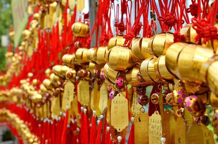 HONG KONG, CHINA - MARCH 13 2018: Holy bell on wall for respect praying at Wong Tai Sin Temple at Kowloon islandのeditorial素材