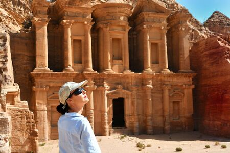 Woman in Ad Deir the Monastery Temple in Petra, Jordanの写真素材