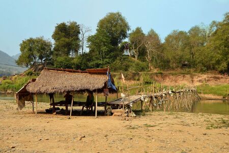 View of a bamboo bridge in Luang Prabang in Laosの写真素材