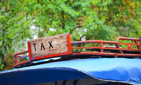 Taxi service vintage sign in country of Laosの写真素材