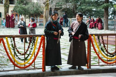 two tibetian womans in traditional clothes. 28 february 2018 India, Dharamsala.のeditorial素材