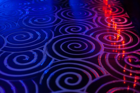 club dance floor interior. spiral tile background whith bokeh reflection.の写真素材