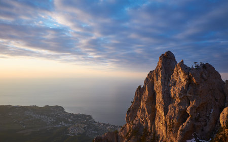 Beautiful sunrise in the mountains. Top of Ai Petri mountain sunset view. Crimea, Russia