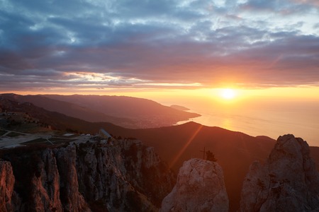 Beautiful sunrise in the mountains. Top of Ai Petri mountain sunset view. Crimea, Russiaの写真素材