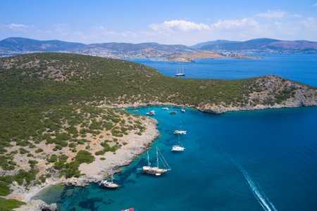 Aerial view of blue sea lagoon and yachts along the mediterranean coast. Landscape of turkish riviera natureの写真素材