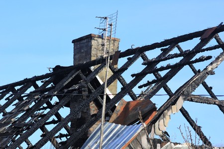 Old house in Poland with burnt out roofの写真素材