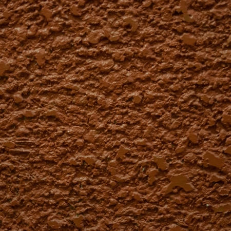 Surfaces of cement plaster walls are not smooth.の写真素材