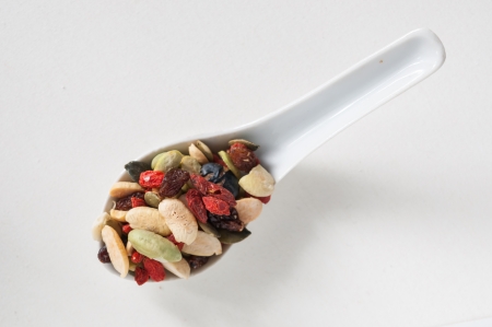Organic mixed nuts on a white backgroundの写真素材