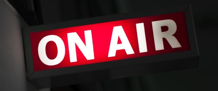 ON AIR board message is lit on in studioの写真素材