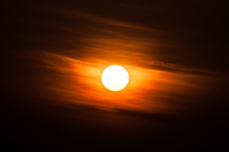 The rising sun has painted the sky in orange colour