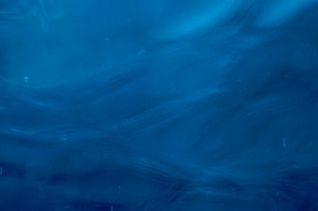 Rings on a water surface caused by a falling drop.の写真素材