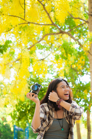 Leisure activities of girl photographer in fine weatherの写真素材