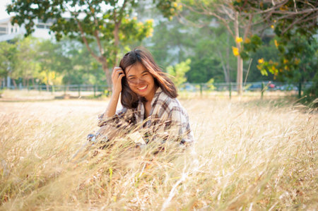 Leisure activities of girl photographer in fine weatherの写真素材