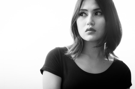 Glamorous young sexy woman on white background, Black & White imageの写真素材