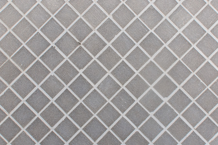 Close up of gray tiled wall for backgroundの写真素材