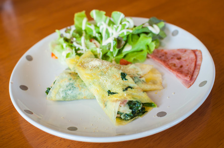 rolled pancakes stuffed with the spinachの写真素材