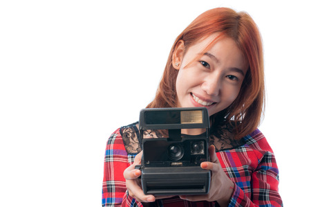 Girl photographer is waiting for the shotの写真素材