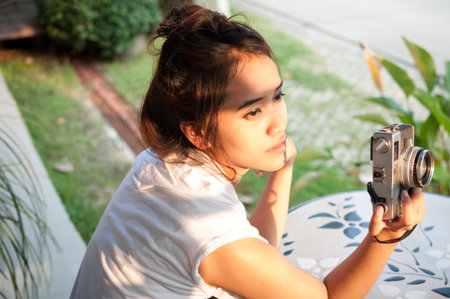 Leisure activities of girl photographers in fine weatherの写真素材