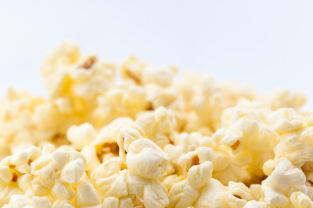 Closeup of popcorn on white backgroundの写真素材
