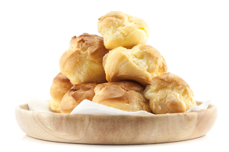 Eclair cake filled vanilla custard isolated on white backgroundの写真素材